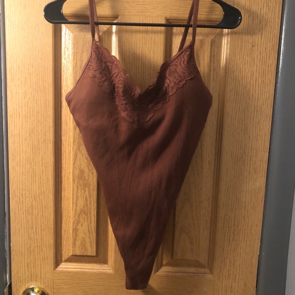 NWOT thong bodysuit with built in bra size L